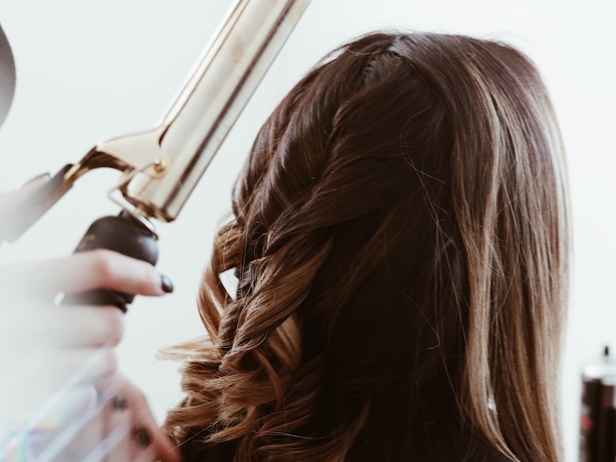 Hair styling with a curling iron
