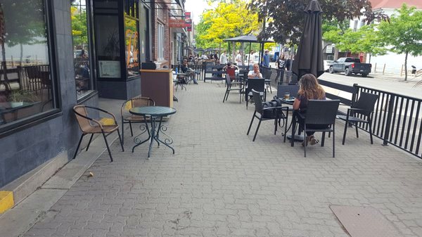 Sidewalk patio seating outside The Vic