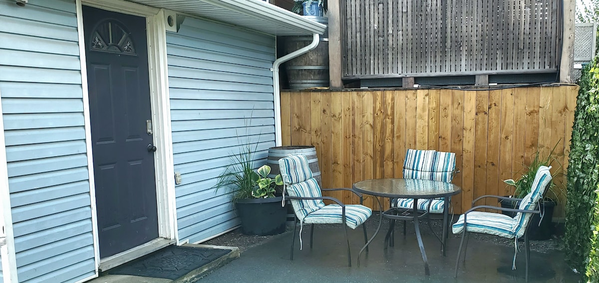 Private patio with table and four chairs